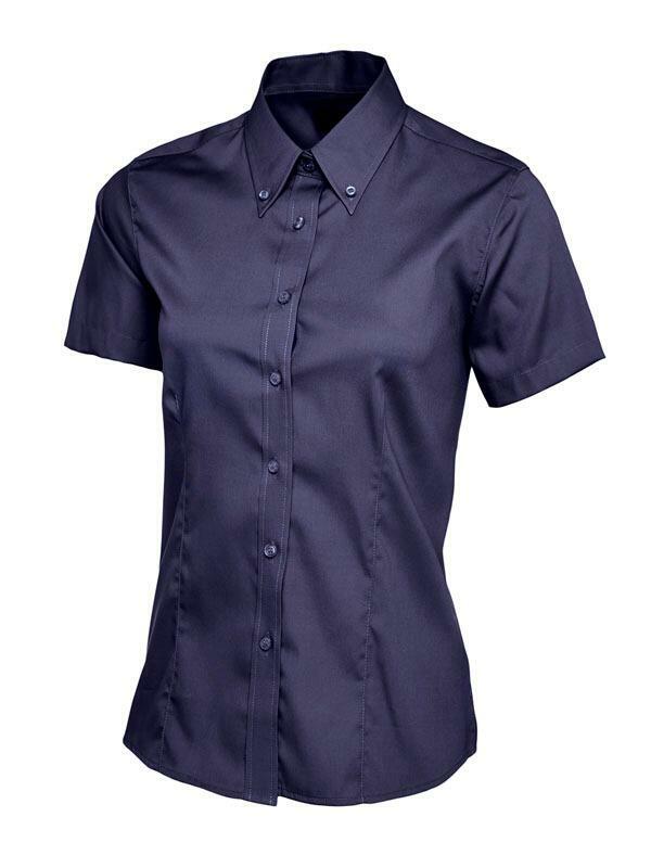 A navy short-sleeved Uneek UC704 button-up shirt displayed on a white background.