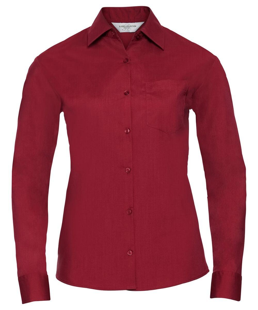 The Russell Collection J934F is a burgundy, long-sleeved shirt featuring a button-up style with a collar and a single chest pocket, showcased against a white background.