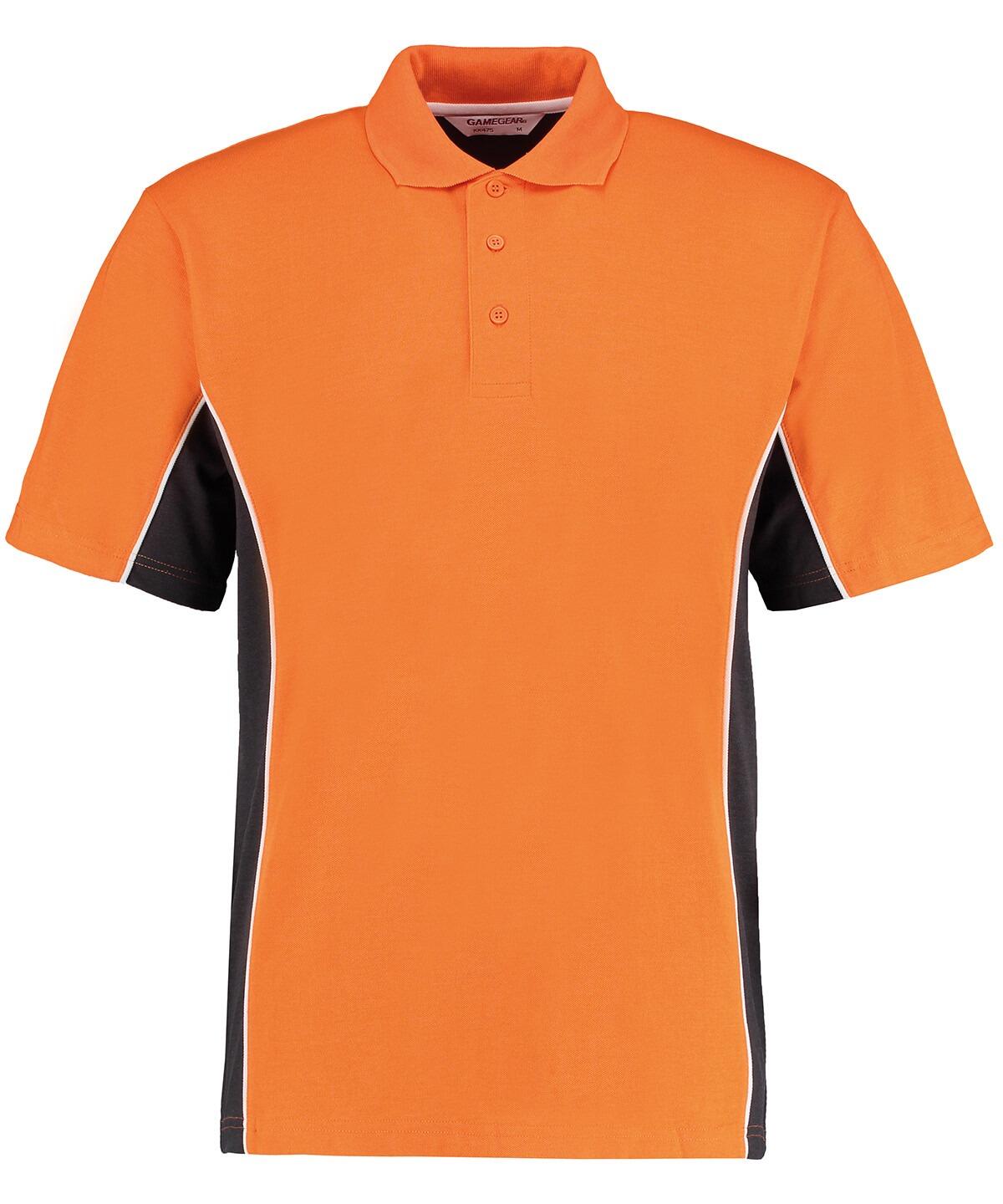 This is the Gamegear KK475 short-sleeved polo shirt, showcasing a vibrant orange color accented with a black side panel. It includes a classic collar, three-button placket, and white piping detailing along the seams of the side panels. The product is presented against a clean white background.