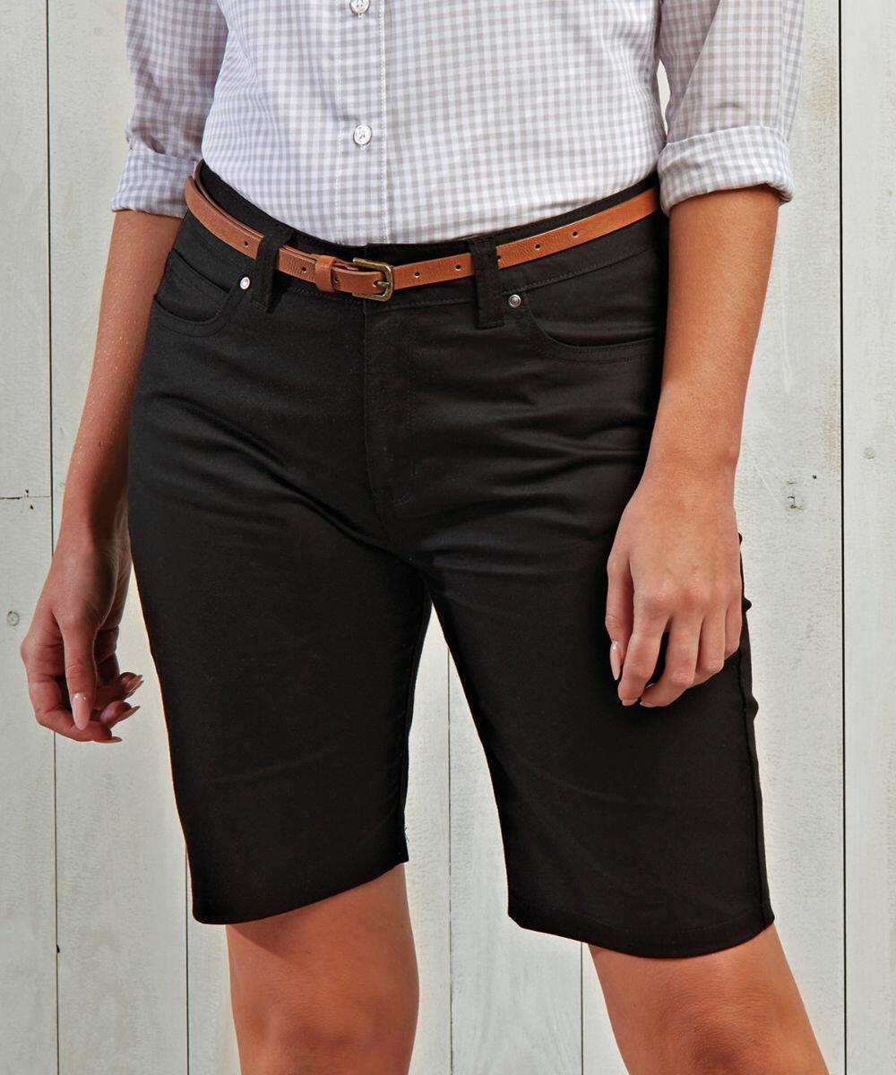 Person wearing a checked shirt, brown belt, and Premier PR572 shorts.