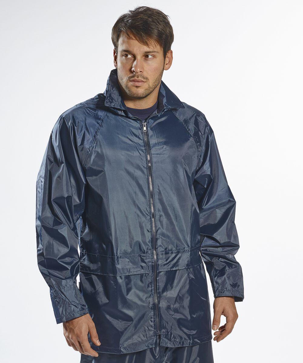 A man is wearing a dark blue, long-sleeved, zip-up PW166 rain jacket by Portwest and looking to the side.