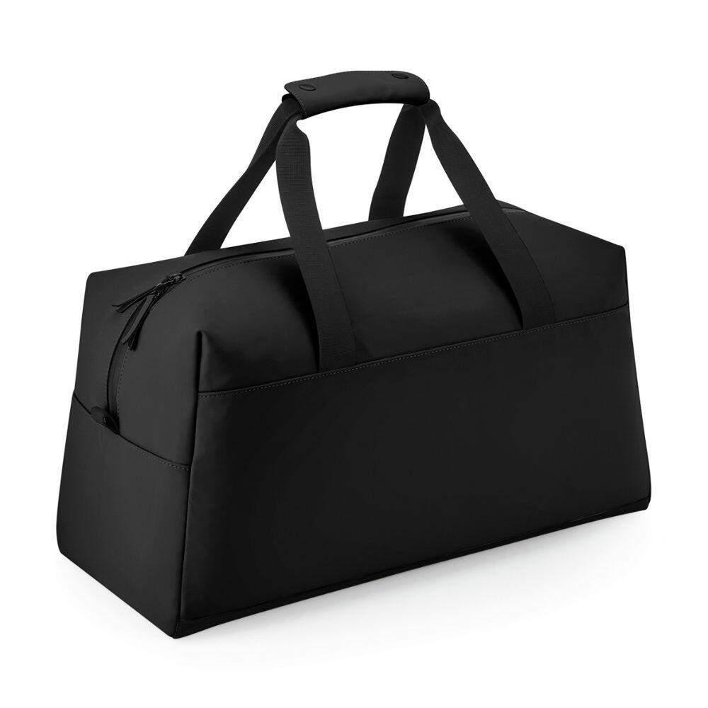 A Bagbase BG338 in black featuring two handles and a shoulder strap.