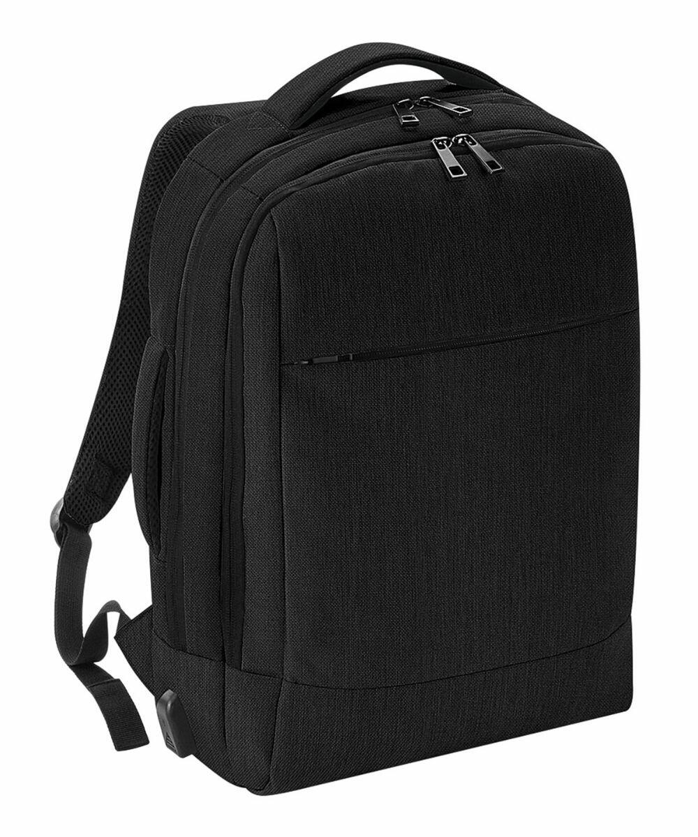 Quadra QD990 black backpack with padded shoulder straps and multiple zippered compartments, set against a white background.