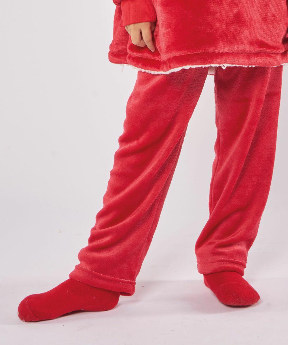 Person wearing Ribbon RI009 red plush pants, red long-sleeve top, and red socks standing against a plain white background.