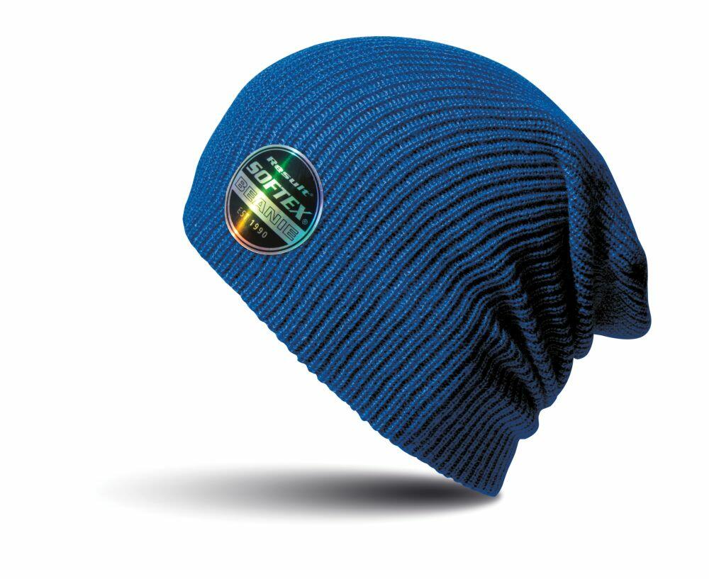 RC31X by Result Winter Essentials, a blue knit beanie featuring a circular logo patch on the side, set against a shadowed white background.