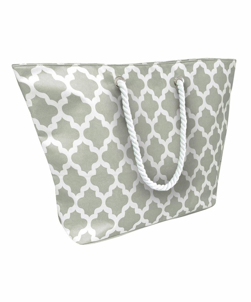 The Home & Living HL205 tote bag features a spacious design with a white and light green quatrefoil pattern and sturdy white rope handles.