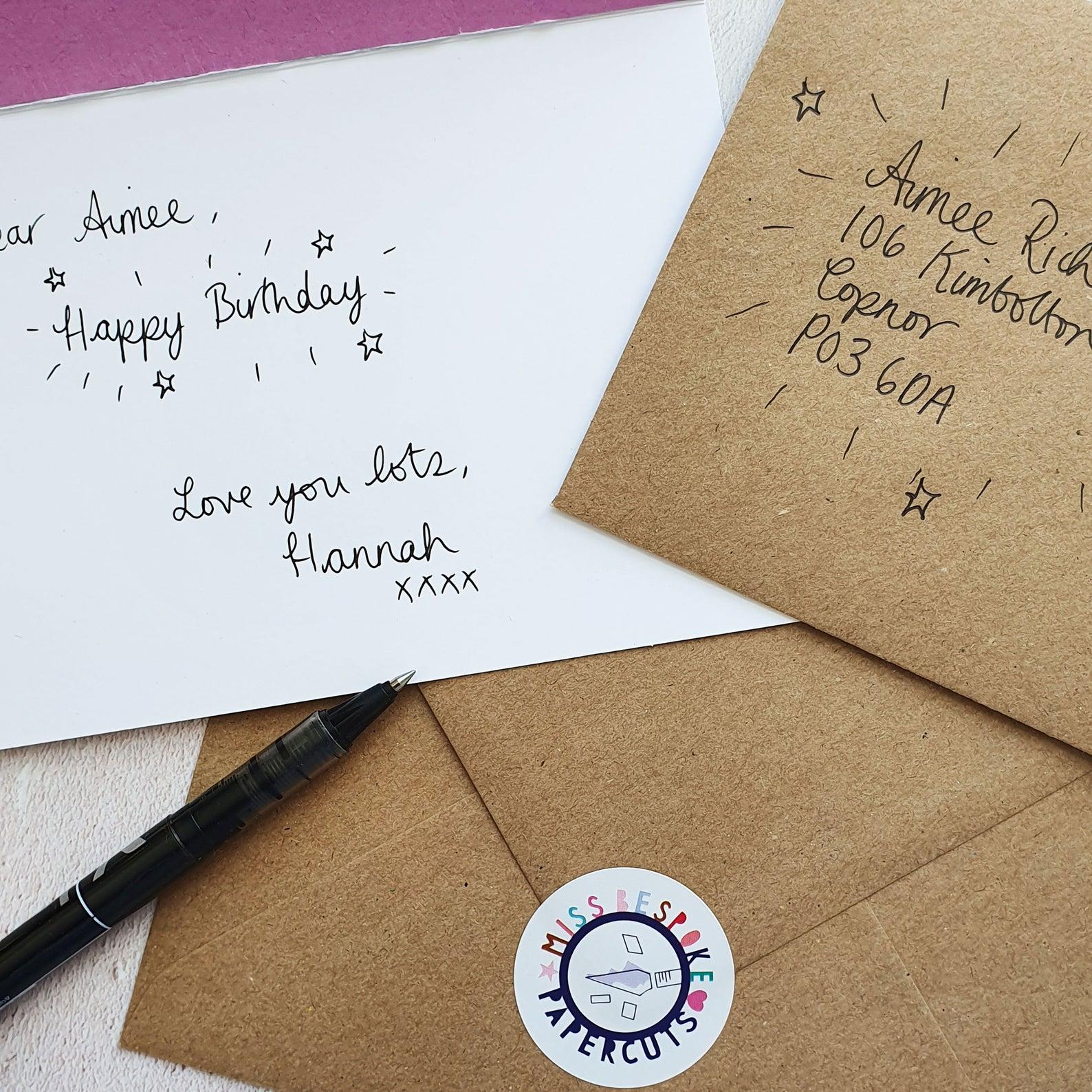 Photo of handwritten message in a card with an addressed envelope for the 'send direct' option