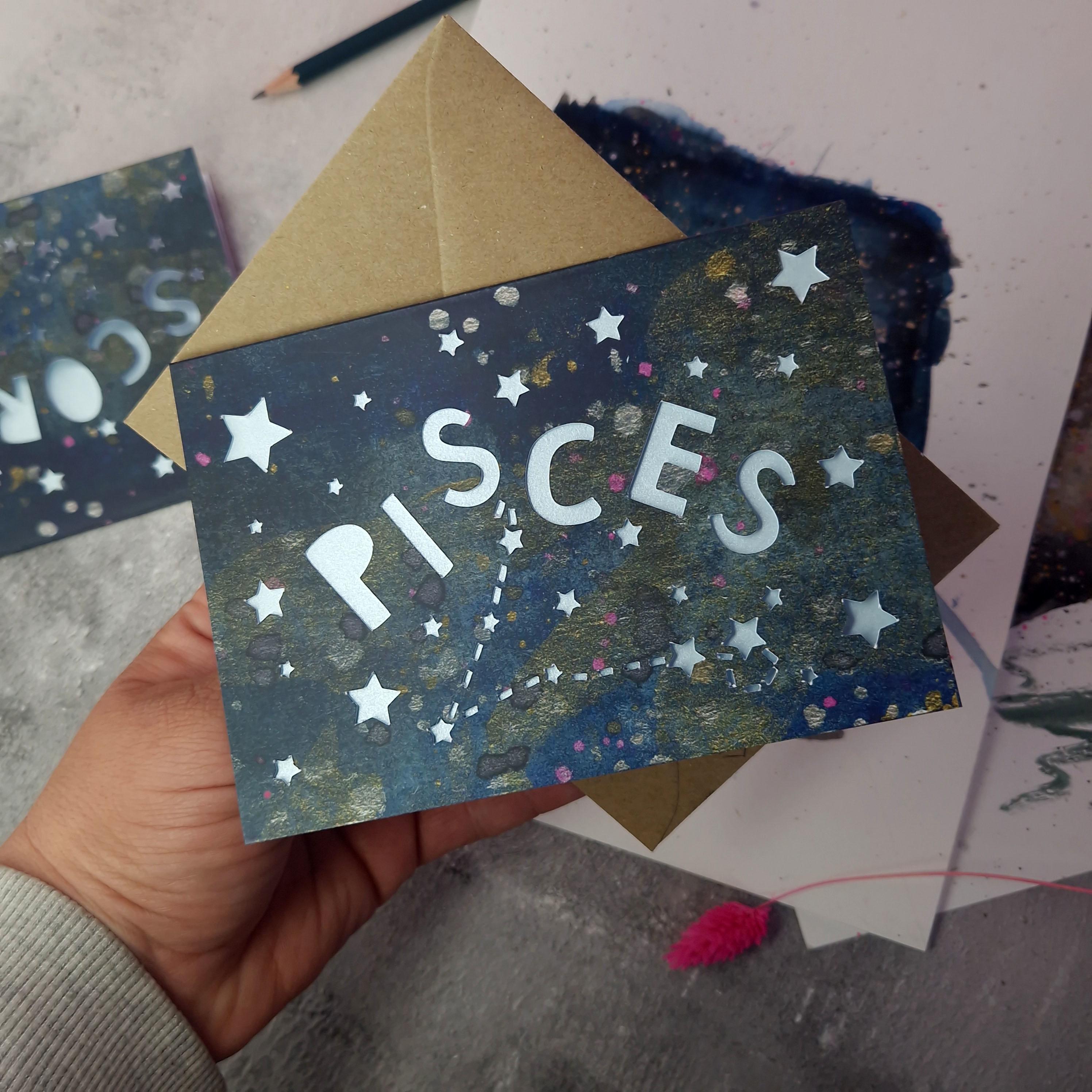 A6 card with a Pisces theme