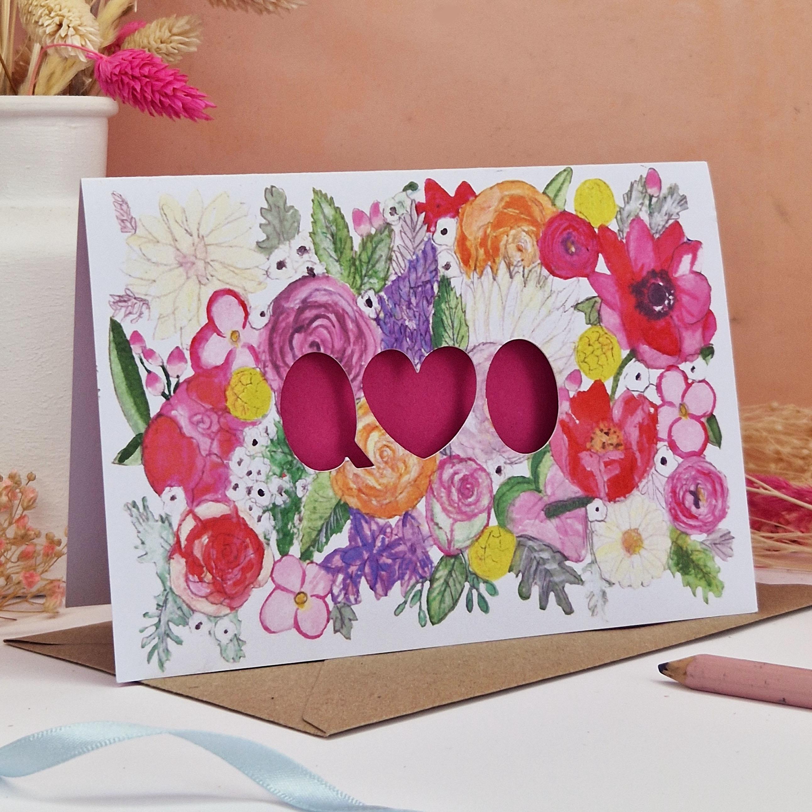 Floral Card with Paper cut text that is personalised with Initials with bright floral background and Yellow paper liner inside.