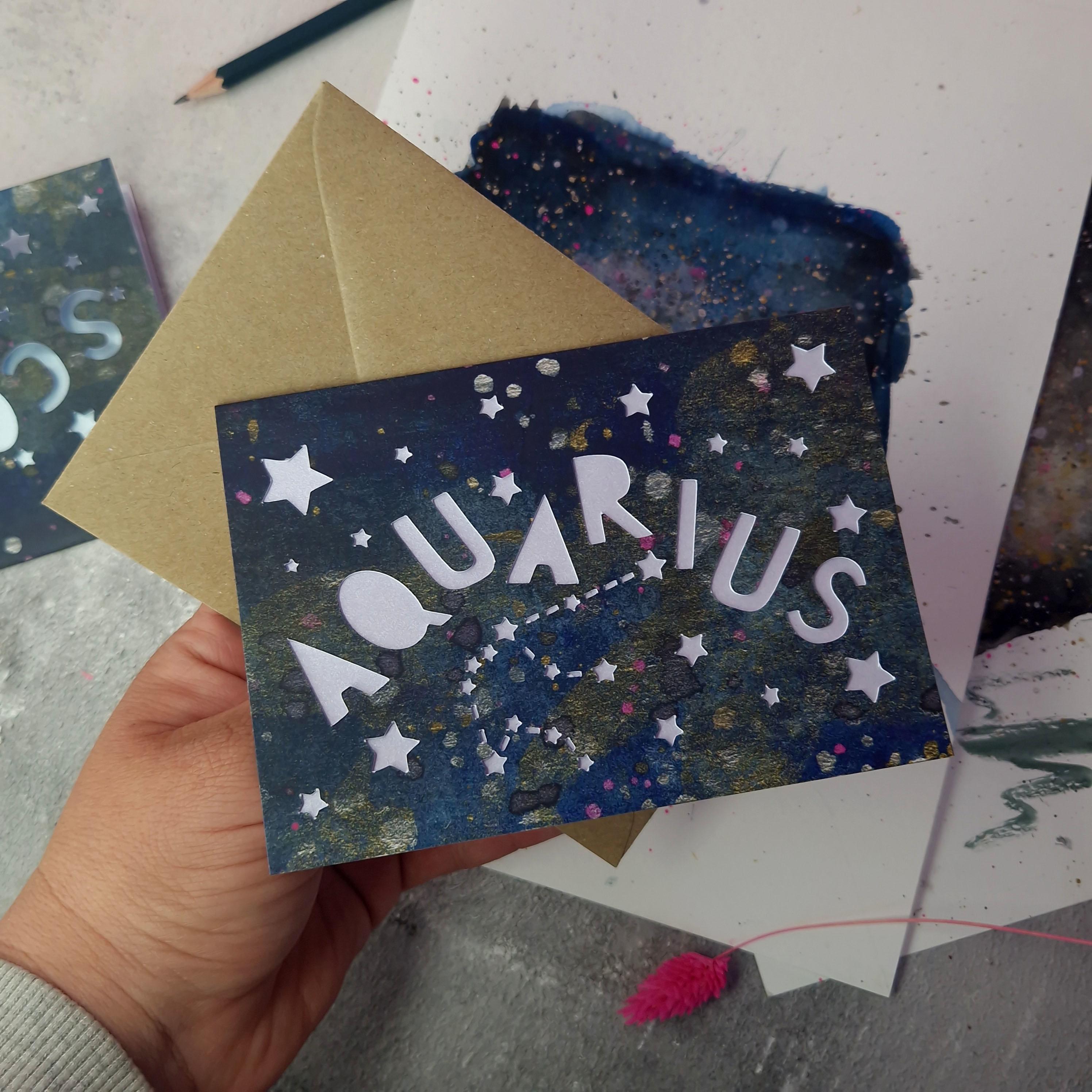 Flat lay of Aquarius card