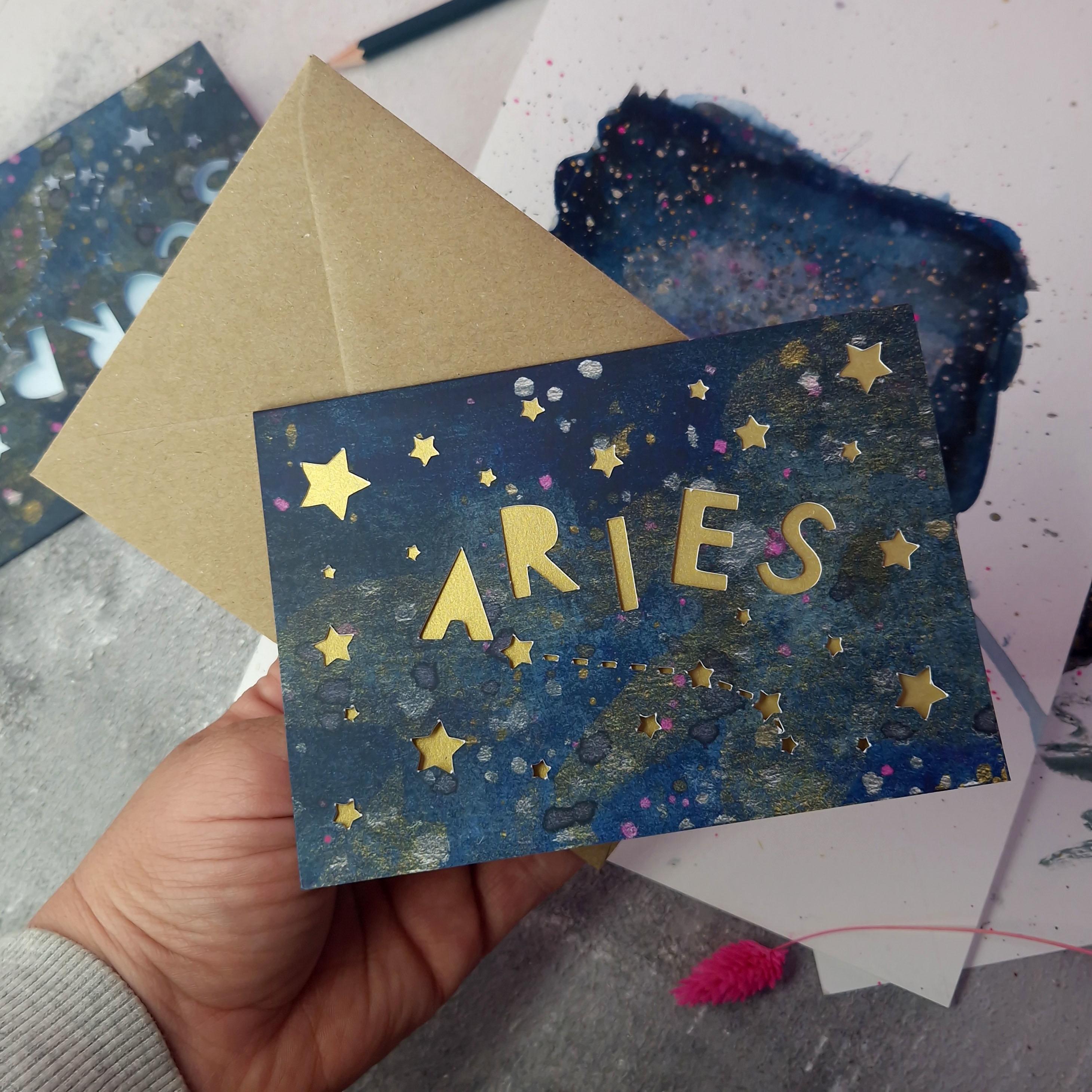 Flat lay of Aries card