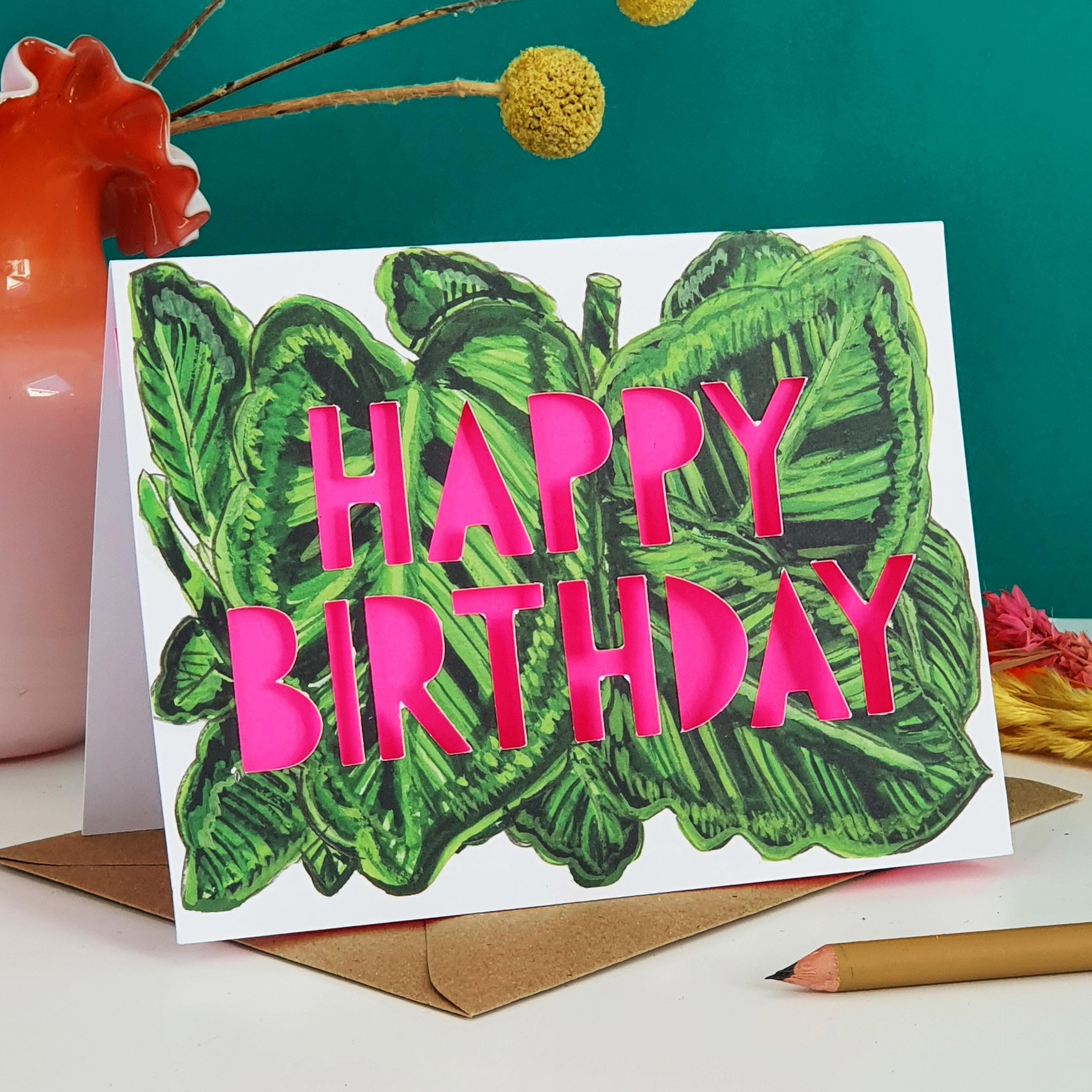 Paper cut card with 'Happy Birthday' typography on a printed spotty begonia 350 gsm card with neon pink liner.