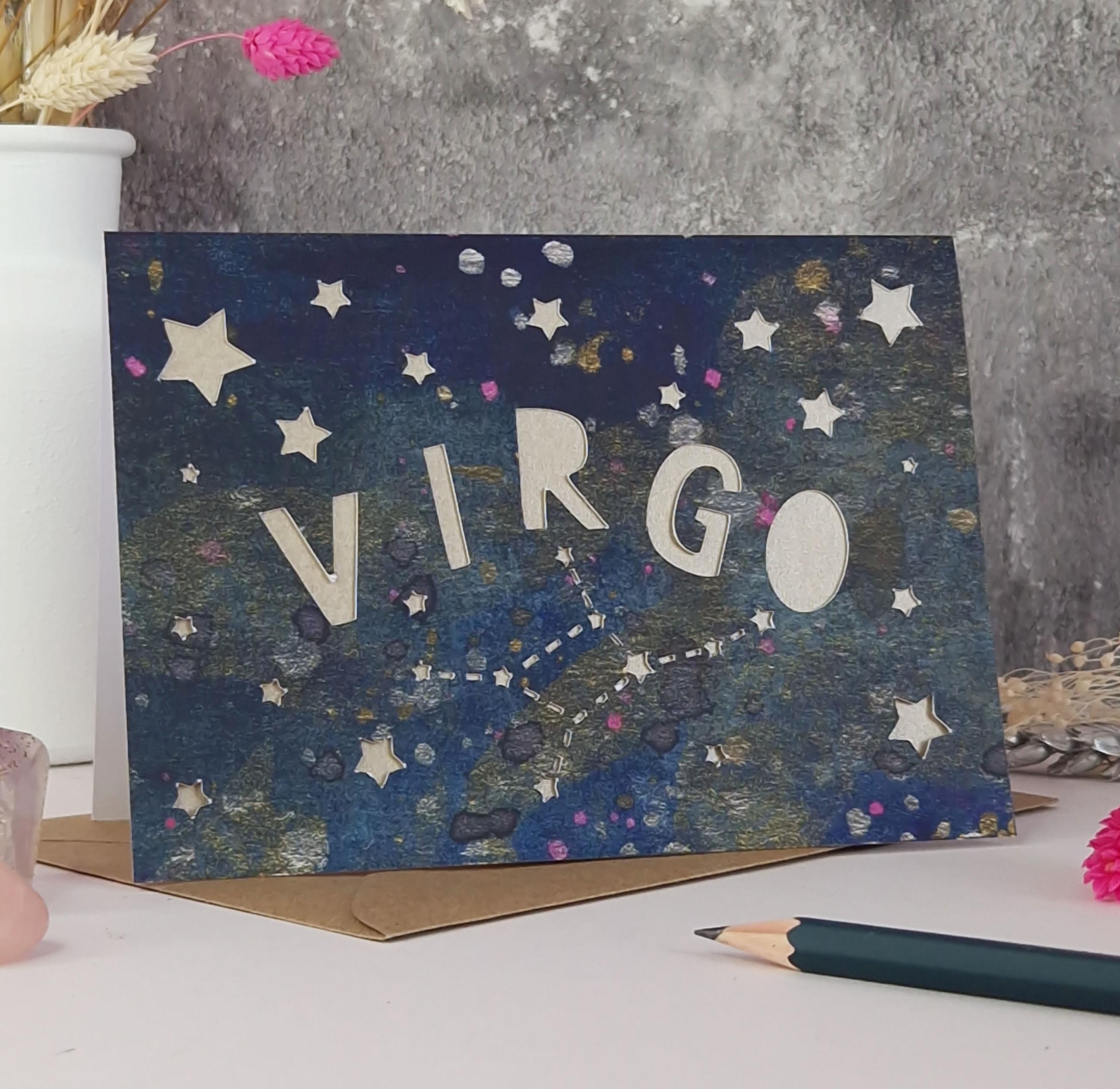 Midnight Blue printed card with papercut text that says 'Virgo' and a mink pearl liner
