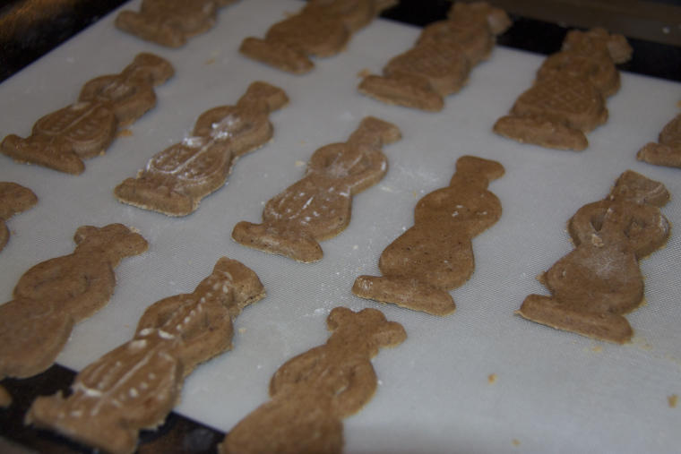 Woman and man vandotsch speculaas infused dough shapes