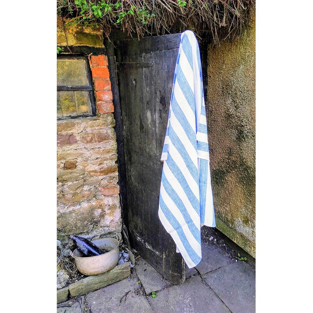 100% Linen Beach/Bath Towel - Philippe - Blue hanging on door