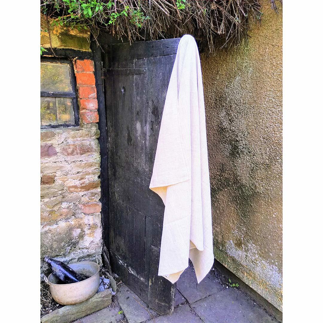 100% Linen Beach/Bath Towel - Francesca Birch hanging on door
