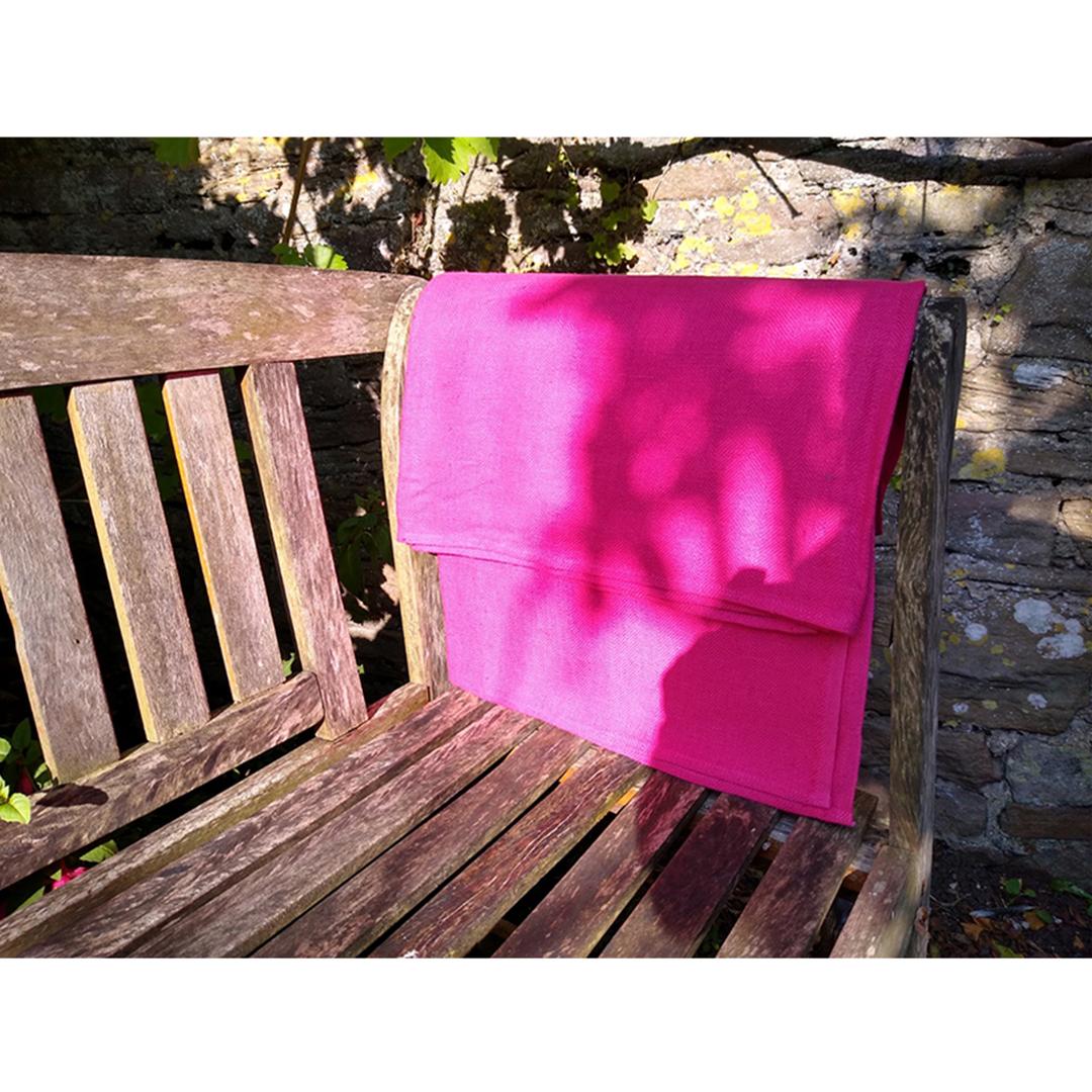 100% Linen Beach/Bath Towel - Lara Bright Pink on bench