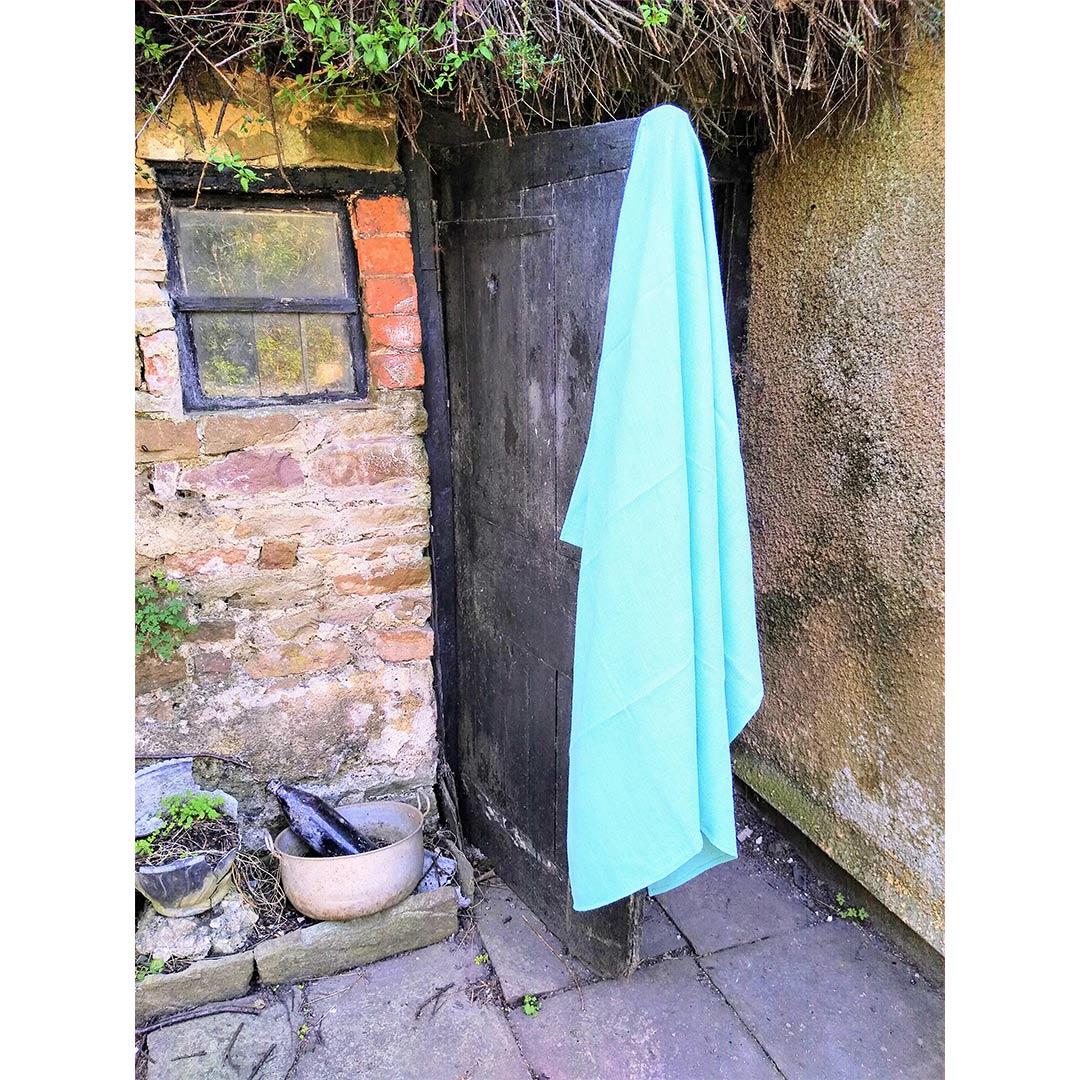 100% Linen Beach/Bath Towel - Lara Aqua hanging on door