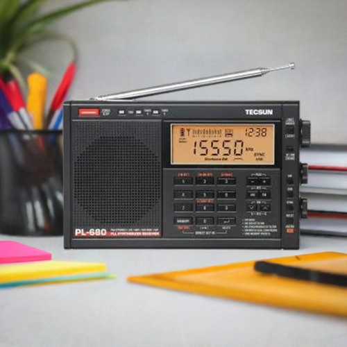 Tecsun PL-680 portable world band radio with telescopic antenna extended