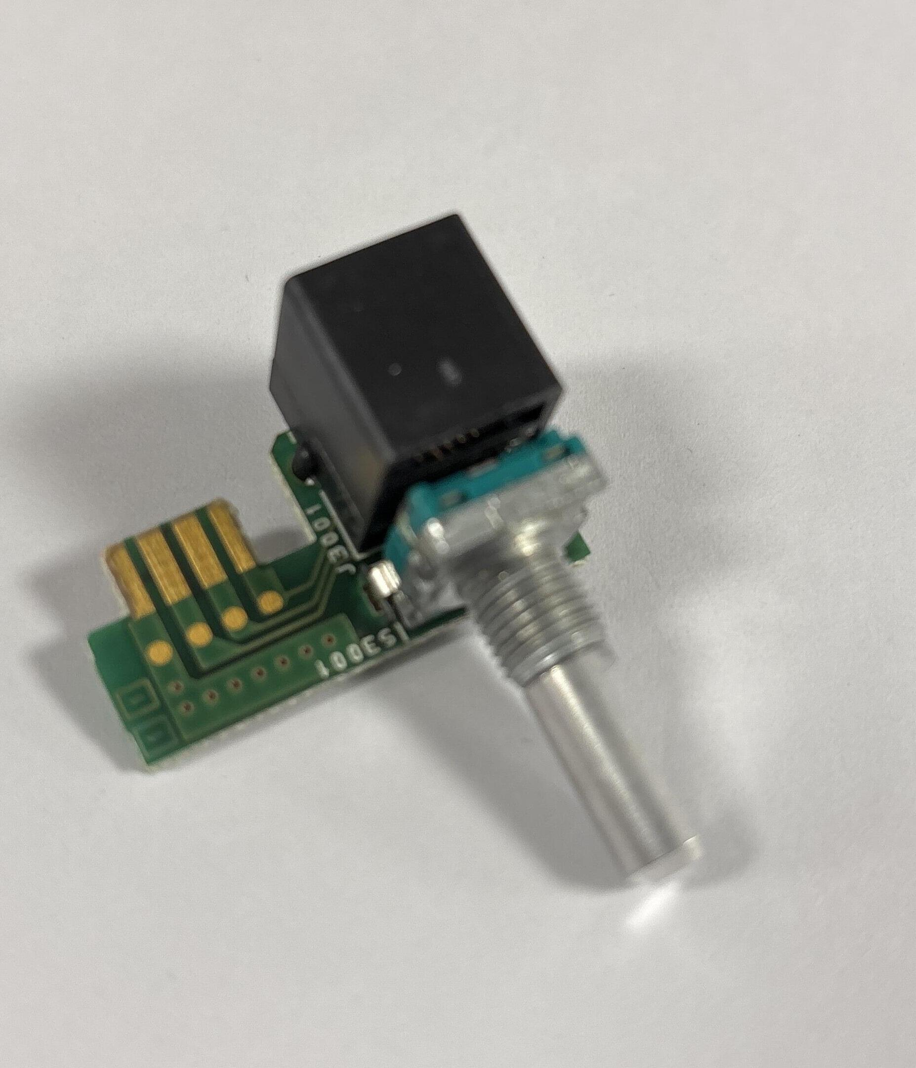 Close-up of Yaesu CB2350001 replacement board with factory connectors and components