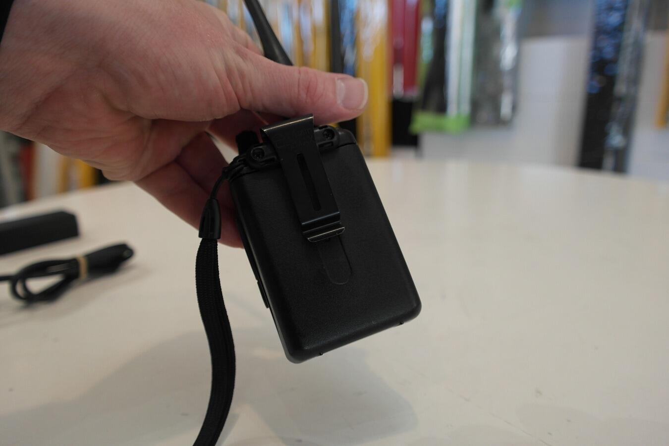 Kenwood TH-F7E handheld radio with antenna attached