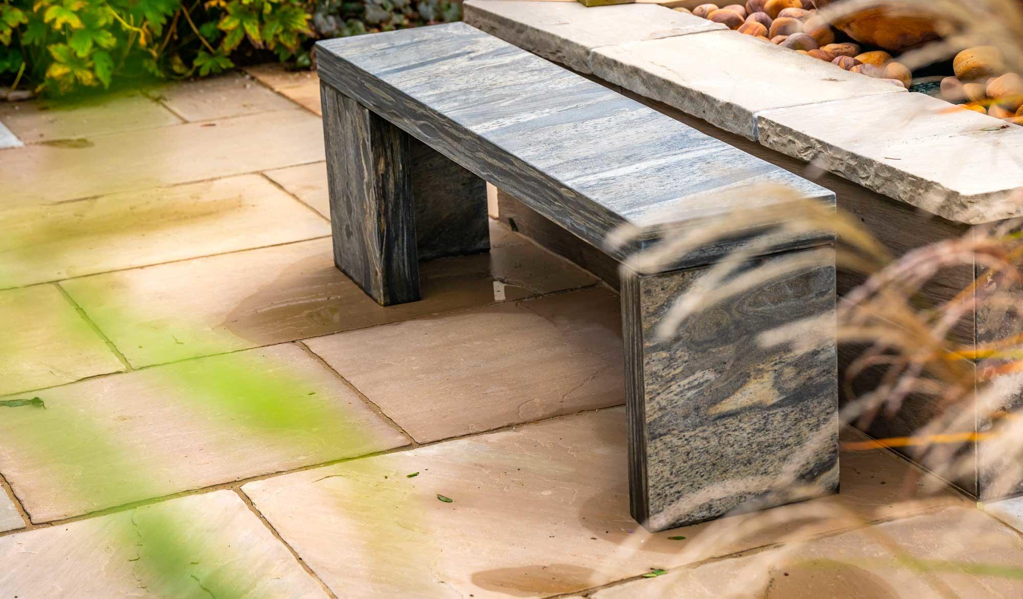 pewter grey stone garden bench in modern cubist design natural sandstone