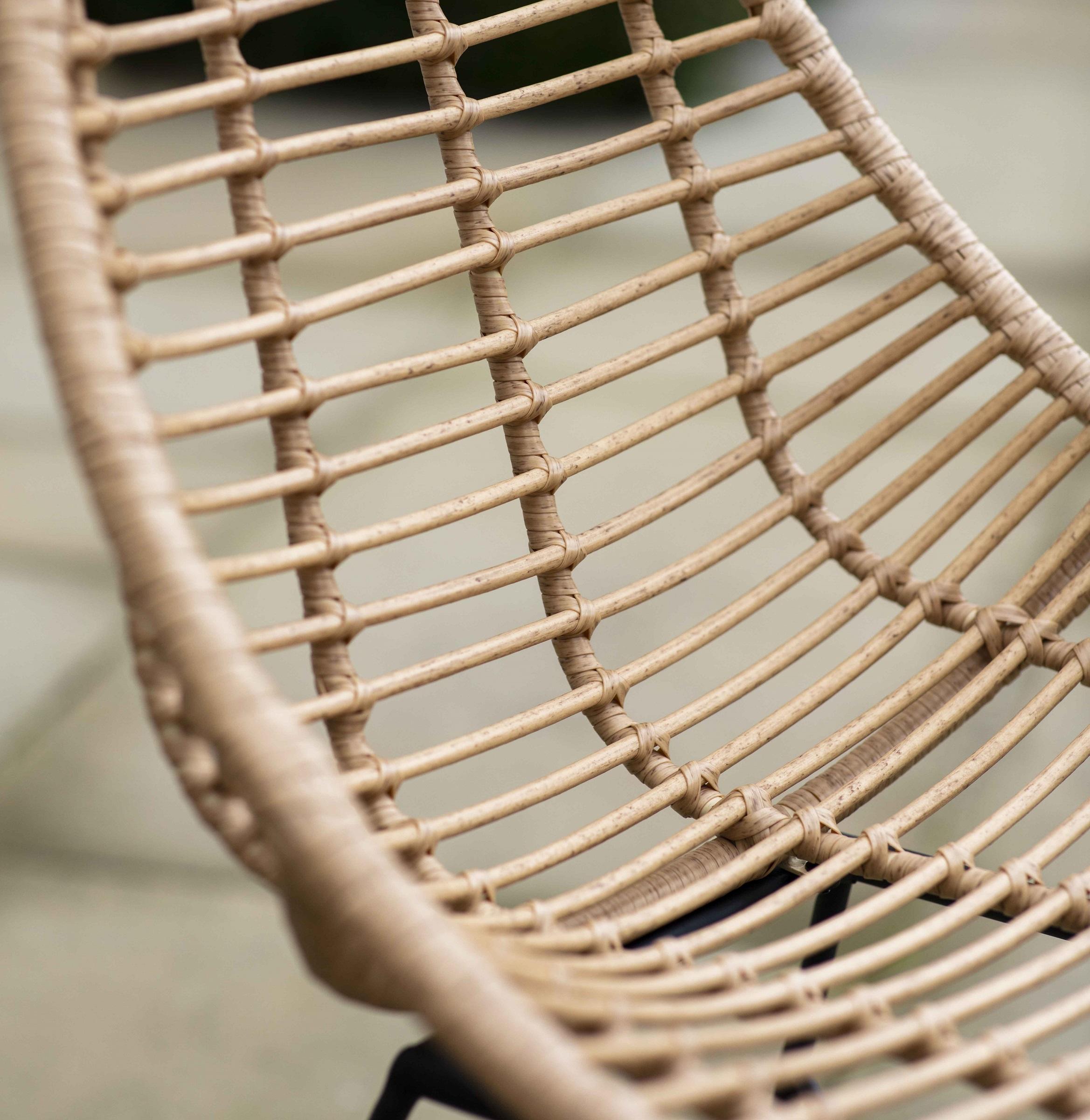 detail of rattan bamboo weave garden scoop bucket dining chairs