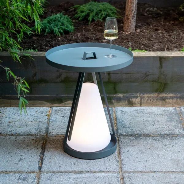 garden coffee table or side table with illuminated light bulb for garden lighting