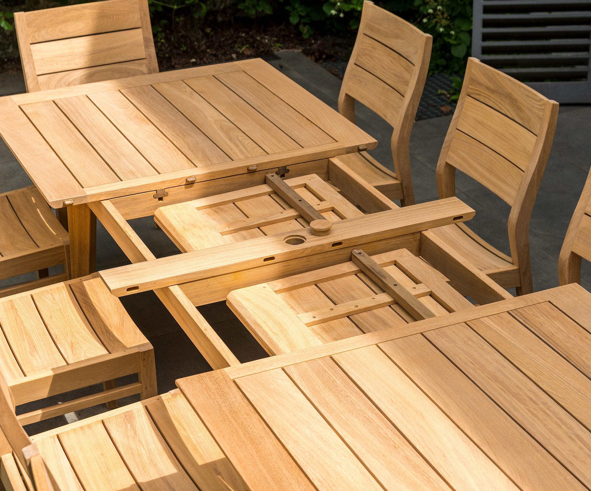 extending modern hardwood garden dining table outdoor eating leaves closed