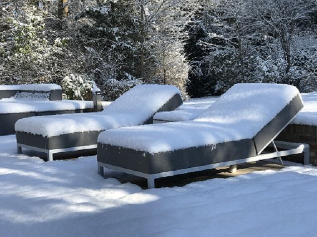 weatherproof fabric and aluminium lounger in snow