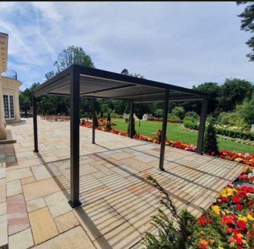 grey modern garden gazebo frame with louvre roof on patio and garden