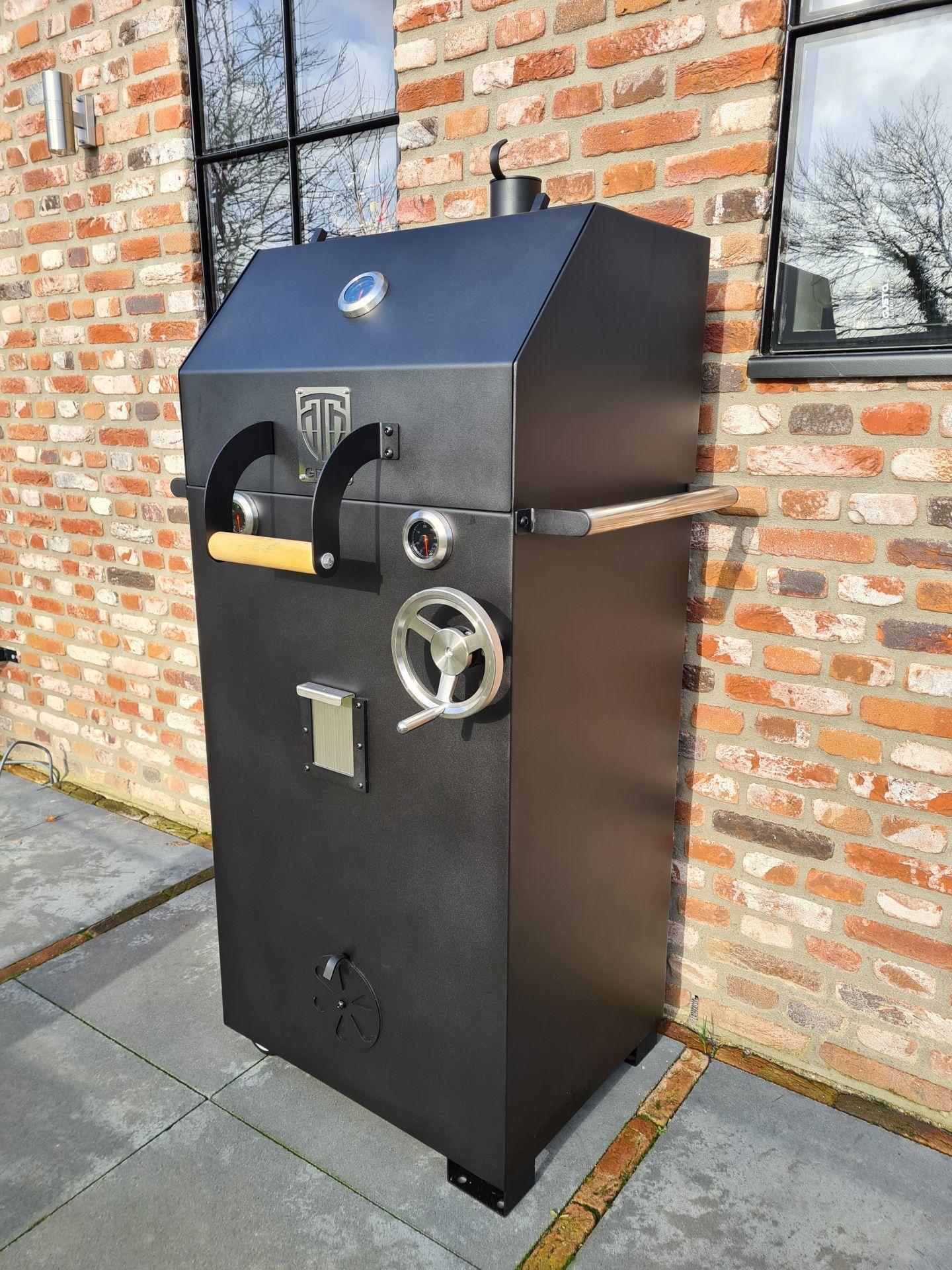 modern black steel charcoal and wood bbq with lid and temperature control