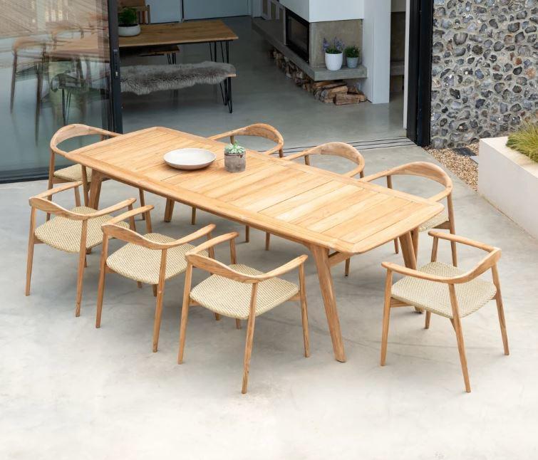modern mid century design teak garden dining table and chairs with all weather stone seats