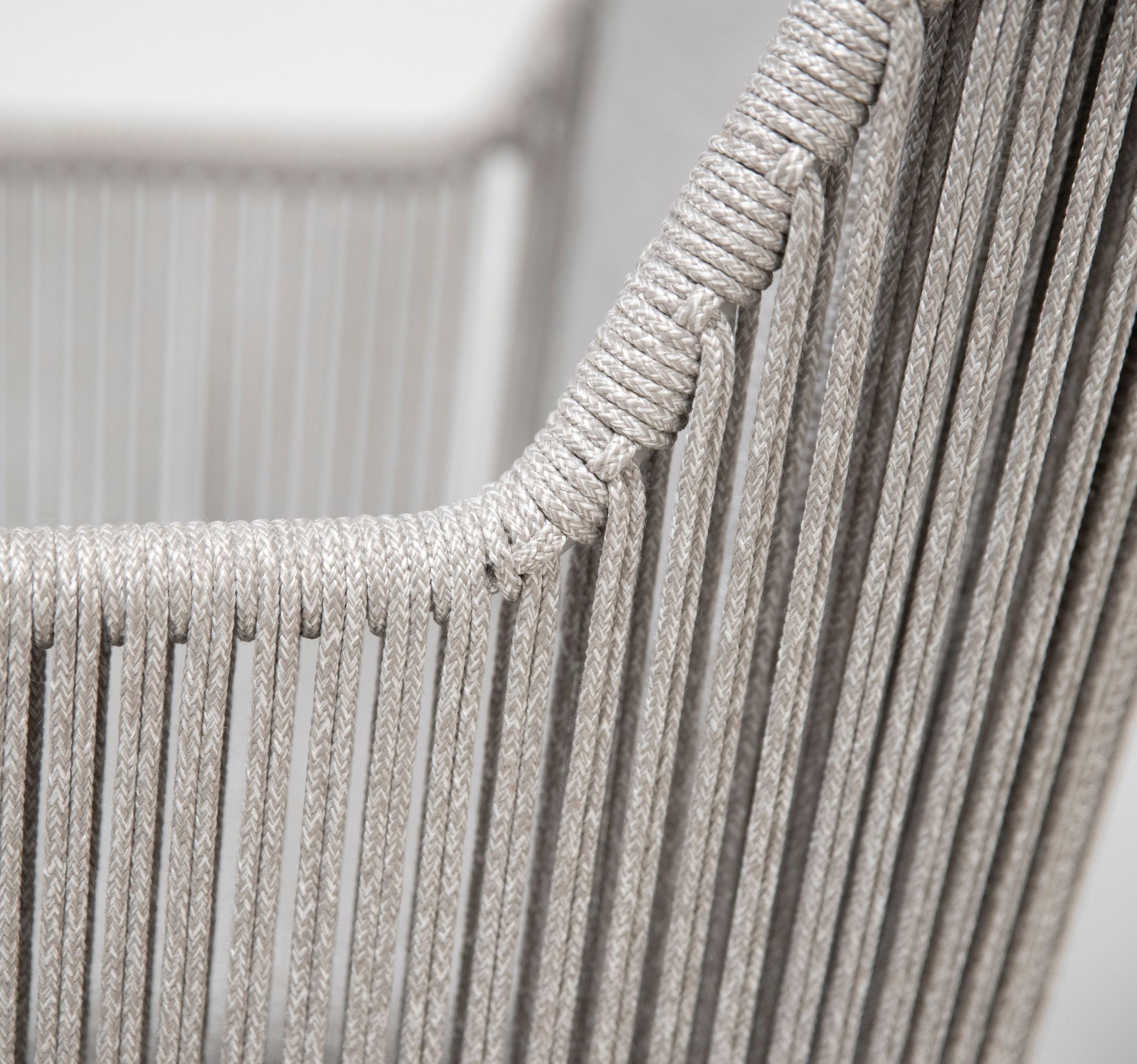 detail of garden patio rope weave dining chair in light grey