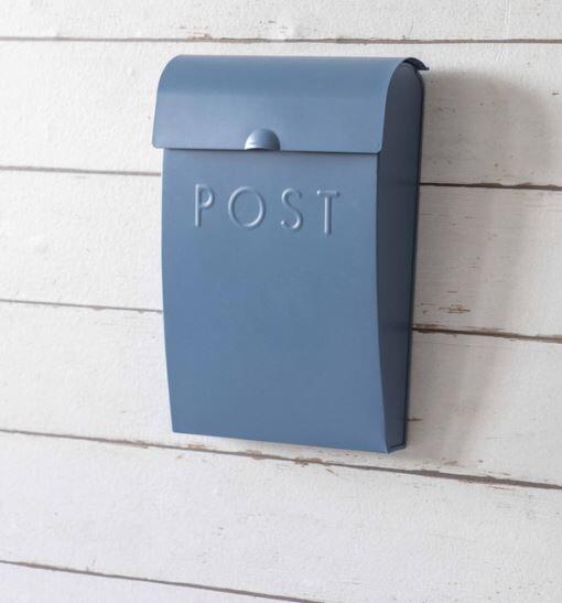 blue modern metal post box or letter box with lid and key wall mounted outdoor garden use