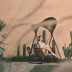 single garden swing seat modern hanging chair in grey charcoal aluminium with ebony black rattan wicker and sun canopy and all weather cushions moon