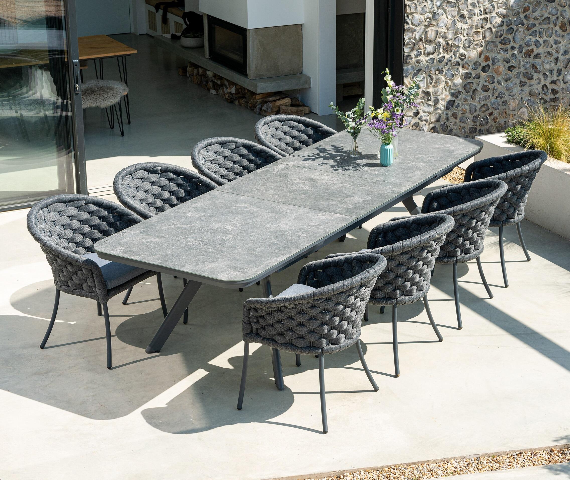 8 seater extending garden dining table metal aluminium hpl and wide all weather rope weave patio dining chairs dark grey