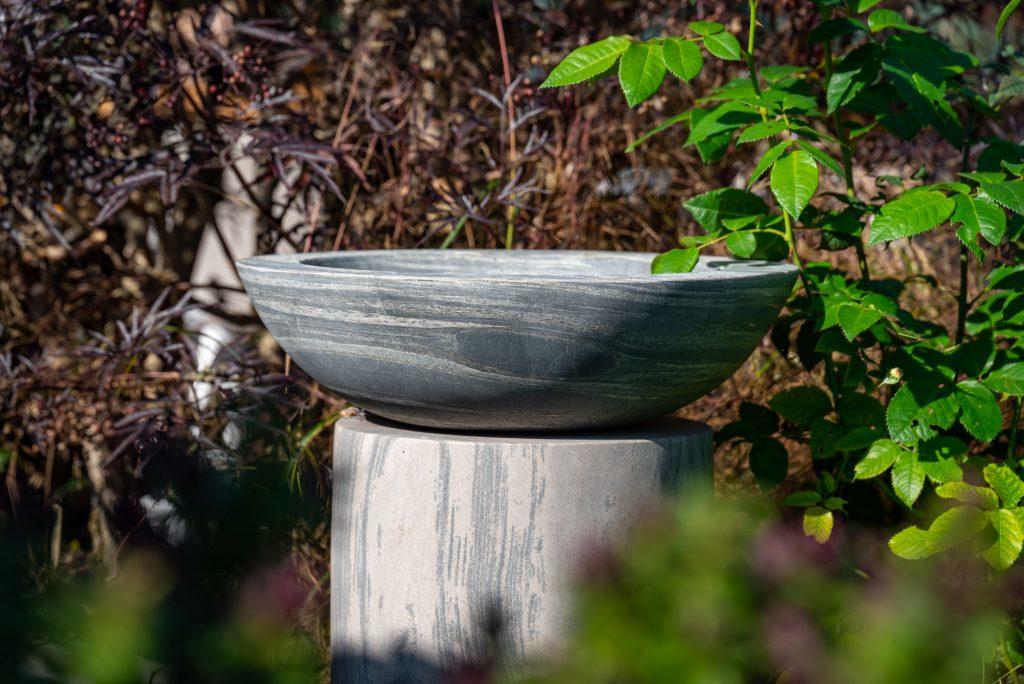 grey natural sandstone bird bath and plinth
