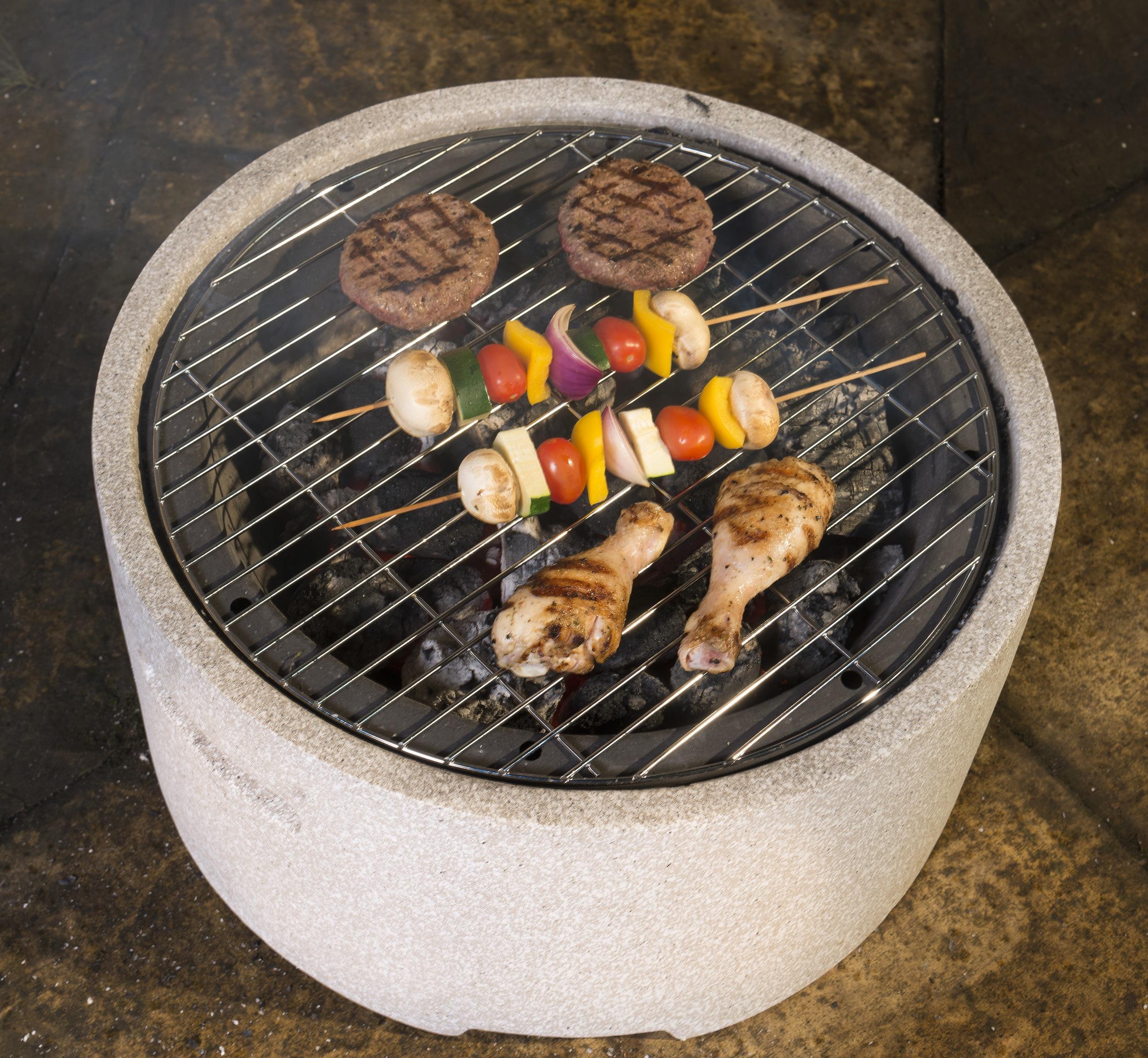 round chunky garden firepit or fire bowl in clay stone with bbq grill