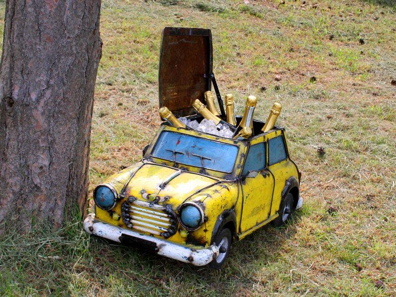 garden novelty drinks cooler from recycled yellow metal from shipping drums