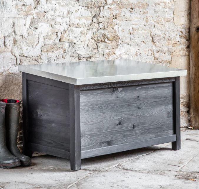 modern garden storage box in black weatherproof wood with metal lid