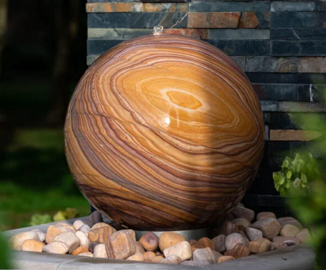 sandstone rainbow garden water feature or fountain in natural stone