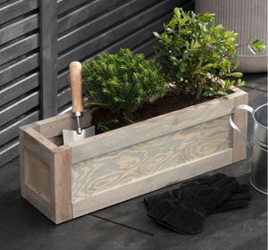wooden trough planter or window box in modern spruce wood