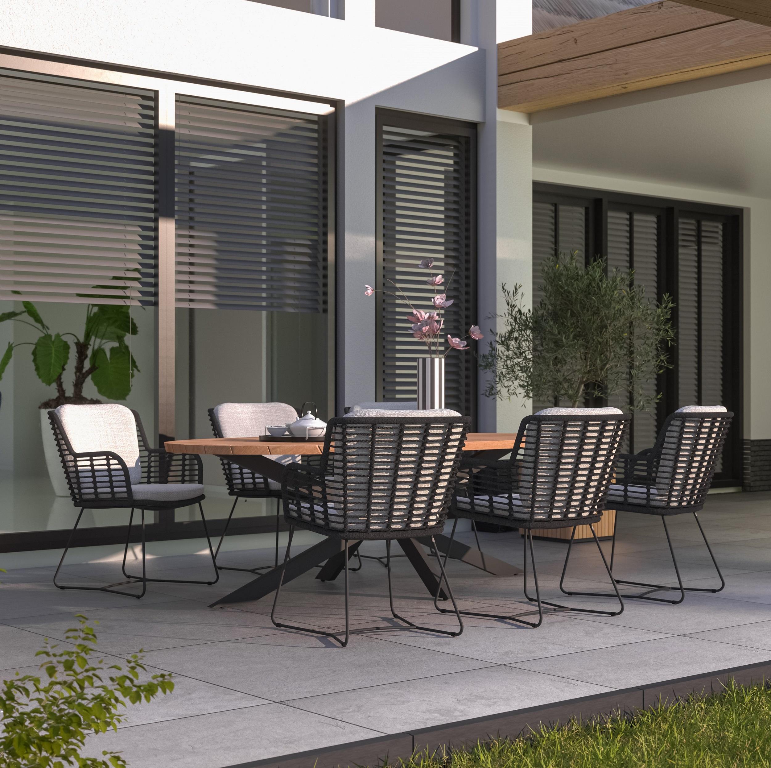 grey rope weave modern garden dining chairs with a large oval teak garden patio dining table with aluminium legs