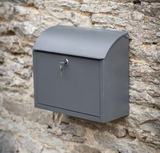 modern post box wall hung for outdoor front door use in charcoal grey powder coated steel with top and front opening