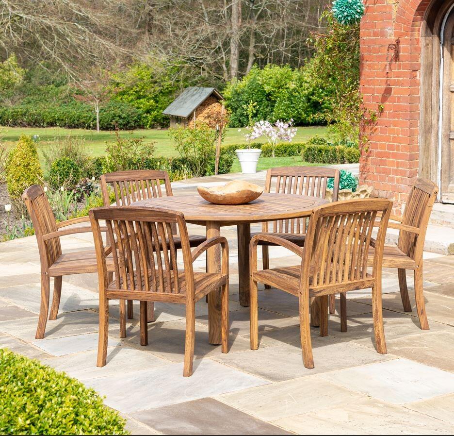 modern round garden dining table 4 or 6 seater armchairs acacia hardwood bolney