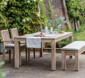 wooden garden dining table and bench and 2 armchairs in acacia hardwood wood porthallow