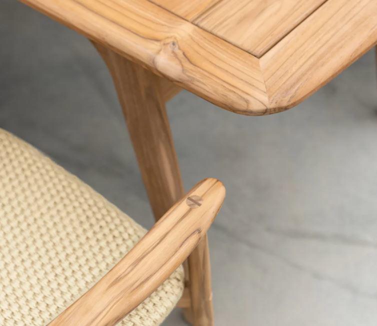 detail of teak garden dining table and chairs