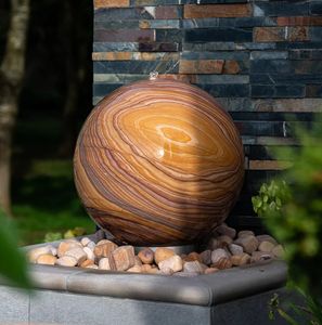 contemporary garden stoone water feature rainbow sandstone sphere belmont