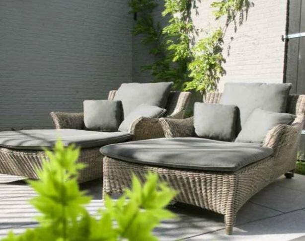 rattan sunbeds or sun loungers in all weather wicker with grey cushions